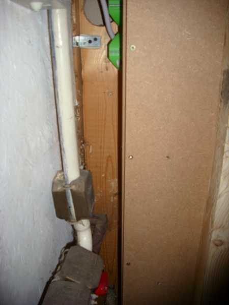 Verkleidung der Haustechnik - passend zu den Küchenfronten, der